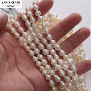 White baroque drop shape 5-6mm diameter x around 7mm length pearl in 40cm strand